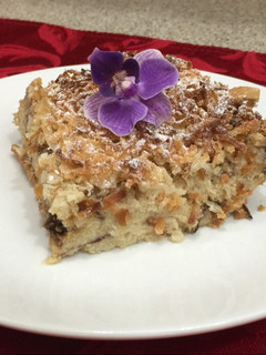 Una foto de Pudín de pan con coco y macadamia