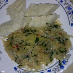 Ugali cabbage and spinach A picture of Ugali cabbage and spinach.