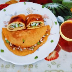 A picture of High protein nutritious stuffed moong dal wrap.