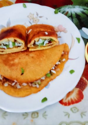 A picture of High protein nutritious stuffed moong dal wrap.