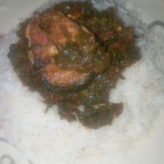 White rice with miyan alayyahu A picture of White rice with miyan alayyahu.