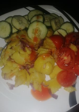 A picture of Sauteed potatoes with onions.