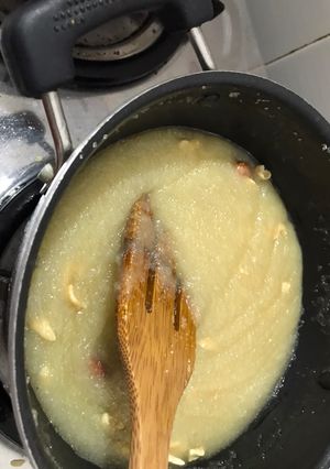 A picture of Sooji halwa with milk.