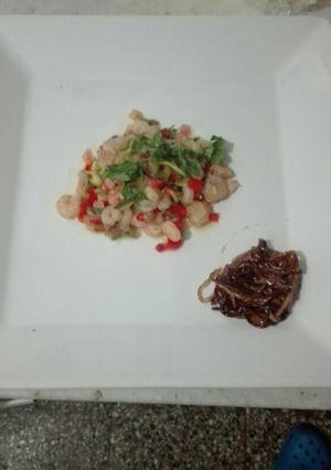 Una foto de Camarones salteados