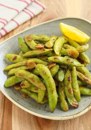 A picture of Irresistible Spicy Grilled Edamame.