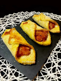 Una foto de Pestiños salados de pan de molde con bacon y queso