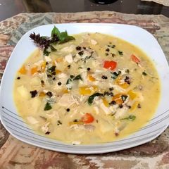 A picture of Pineapple curry chicken soup.