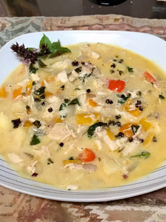 A picture of Pineapple curry chicken soup.