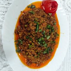 A picture of Mutton mince with green peas.