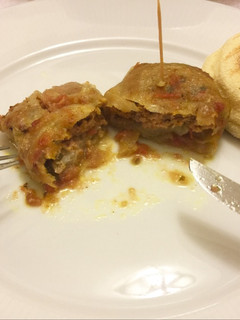 Una foto de Canelones de col