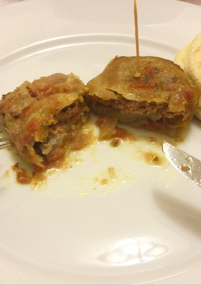 Una foto de Canelones de col