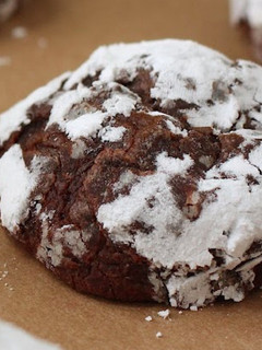 A picture of Chocolate crinkle cookie with buttercream frosting.