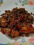 Arroz con conserva de chipirones rellenos, en su tinta