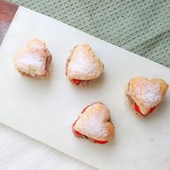 Nutella Cream & Fresh Strawberry Puff Pastry Hearts A picture of Nutella Cream & Fresh Strawberry Puff Pastry Hearts.