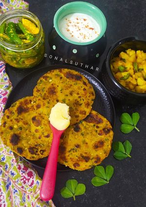 A picture of Bajra Methi Thepla with Potato bhaji.