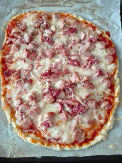 Una foto de Pizza mix de carne