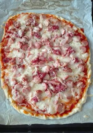 Una foto de Pizza mix de carne