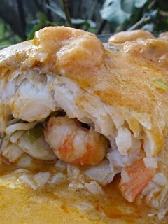 Una foto de Merluza rellena de gambas