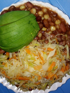 A picture of Stewed githeri with steamed cabbage.