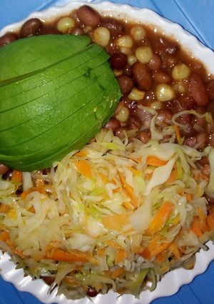 A picture of Stewed githeri with steamed cabbage.