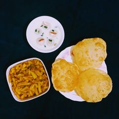 A picture of Aloo Pyaz Sabji / Potato Onion semi dry Curry.