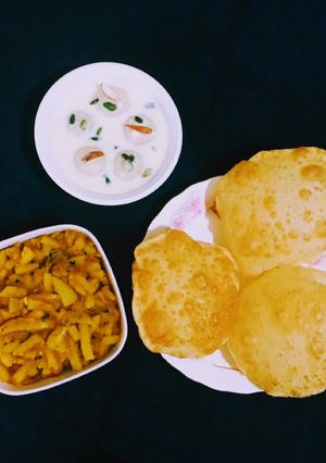 A picture of Aloo Pyaz Sabji / Potato Onion semi dry Curry.