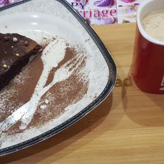 A picture of 7 spoon unique cake in fry pan, Eggless cake.