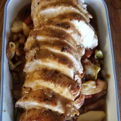 A picture of Roast Pork Loin with Apples.