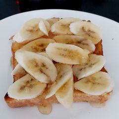 My French toast with 🍌 and 🍯 A picture of My French toast with 🍌 and 🍯.
