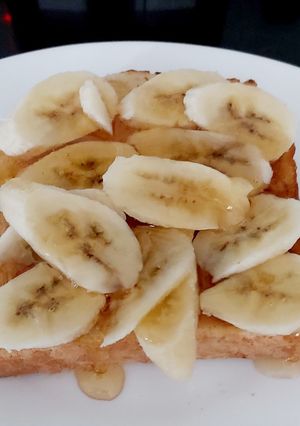 A picture of My French toast with 🍌 and 🍯.
