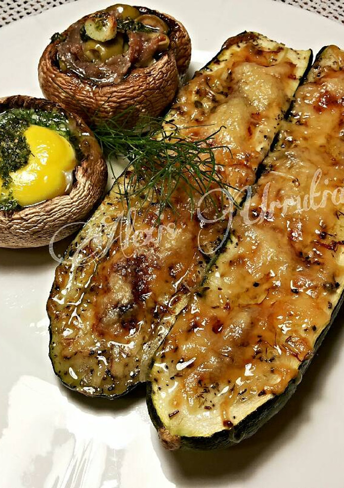Una foto de Calabacines a la mediterránea, gratinados con queso emmental