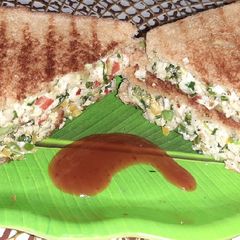 A picture of Colorful Cheesy paneer Sandwich.