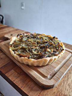 Una foto de Mini tartas de cebolla y orégano
