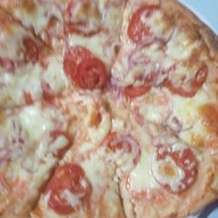 A picture of Double stacked Margarita pizza.