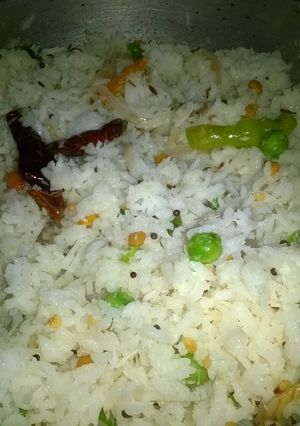 A picture of Quick & tasty coconut peas rice.