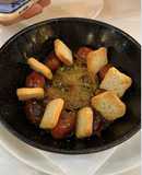 Choricitos a la sidra con cebolla caramelizada