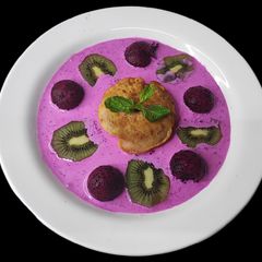 A picture of Dragon fruit cream with biscuit pop.