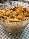 Salade de pommes de terre aux harengs, tomates et oignons