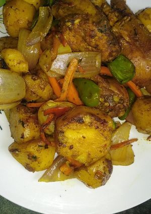 A picture of Oven grilled potatoes n chicken.