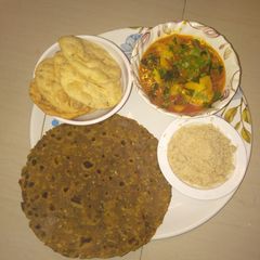 Bajri thepla with potato sabji A picture of Bajri thepla with potato sabji.