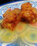 Pollo rebozado con salsa de piña