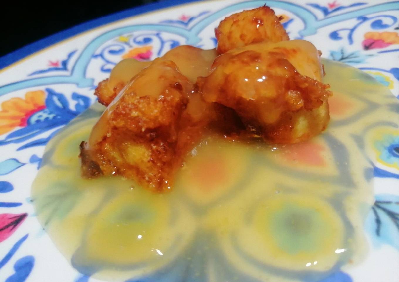 Pollo rebozado con salsa de piña