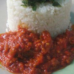 A picture of Fish stew and vegetable.