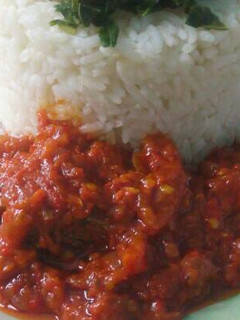 A picture of Fish stew and vegetable.