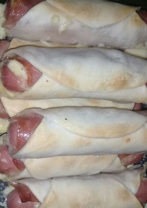Una foto de Salchichas envueltas a mi manera