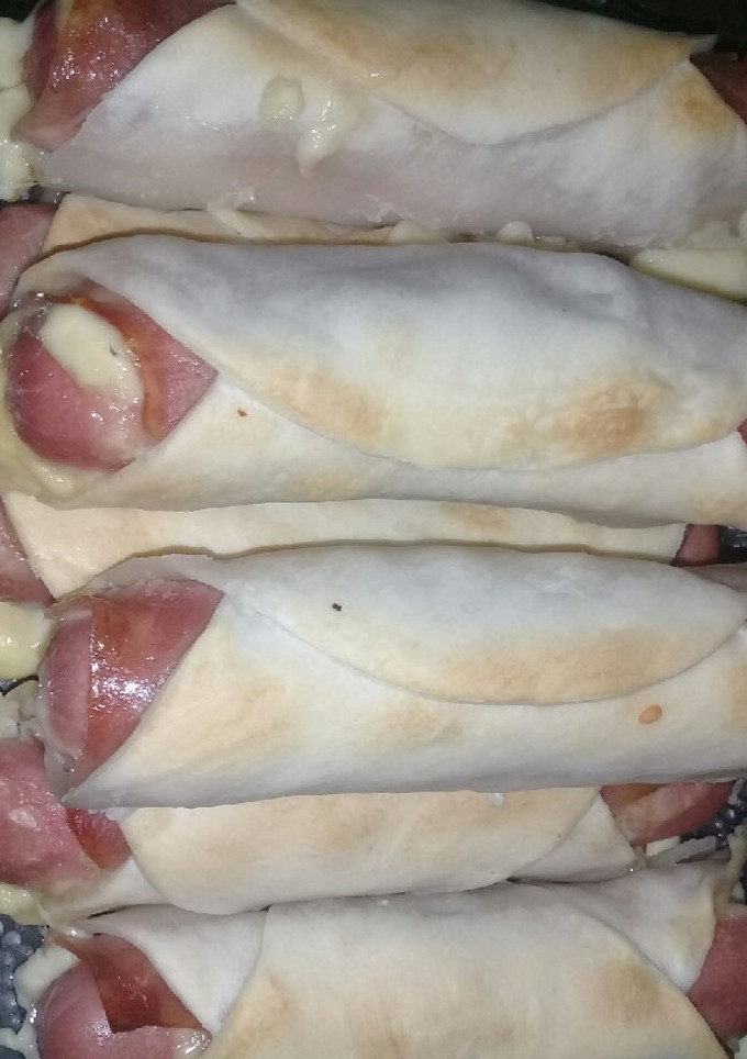 Una foto de Salchichas envueltas a mi manera