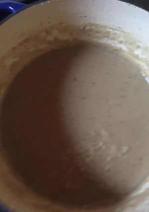 A picture of Brown gravy from scratch.