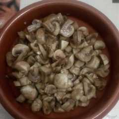 Una foto de Champiñones ajito