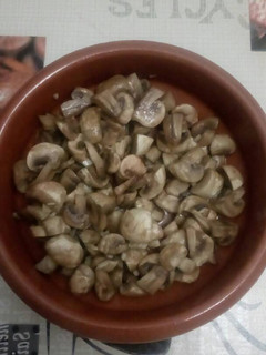 Una foto de Champiñones ajito