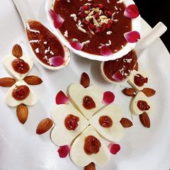A picture of Anar mava paneer halwa.